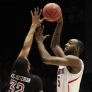 North Carolina State forward C.J. Leslie (5) shoots over Temple forward Rahlir Hollis-Jefferson (32) during the first half of a second-round game at the NCAA college basketball tournament, Friday, March 22, 2013, in Dayton, Ohio. (AP Photo/Skip Peterson)