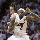 Miami Heat shooting guard Mike Miller (13) and LeBron James celebrate during the second half of Game 2 of the NBA Finals basketball game against the San Antonio Spurs, Sunday, June 9, 2013 in Miami. (AP Photo/Lynne Sladky)