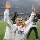 FILE- In Sunday, June 17, 2007 file photo, Real Madrid player David Beckham waves goodbye to his fans after the Spanish League soccer match against Mallorca in Madrid. David Beckham will join Paris Saint-Germain on Thursday, Jan. 31, 2013, opting for a move to France after mulling over lucrative offers from around the world since leaving the Los Angeles Galaxy. The 37-year-old Beckham was to undergo a medical examination in the French capital before being officially presented as PSG's latest recruit, a person familiar with the situation told The Associated Press. The person spoke on condition of anonymity because the deal has not yet been completed. (AP Photo/Fernando Bustamante, File)