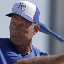Kansas City Royals Hall of Famer George Brett hits to players during a spring training baseball workout Saturday, Feb. 16, 2013, in Surprise, Ariz. (AP Photo/Charlie Riedel)