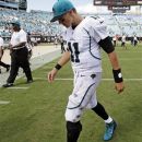 Jacksonville Jaguars quarterback Blaine Gabbert walks off the field after their 27-7 loss to the Houston Texans in an NFL football game, Sunday, Sept. 16, 2012, in Jacksonville, Fla. (AP Photo/John Raoux)