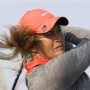 Suzann Pettersen of Norway watches her tee shot at the ninth hole during the first round of the LPGA Championship golf tournament at Sky72 Golf Club in Incheon, west of Seoul, South Korea, Friday, Oct. 19, 2012. Pettersen finished her first round in the lead at nine under par. (AP Photo/Lee Jin-man)