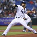 Tampa Bay Rays starting pitcher David Price delivers to the Boston Red Sox during the first inning of a baseball game Saturday, July 14, 2012, in St. Petersburg, Fla. (AP Photo/Brian Blanco)