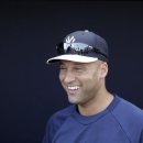 New York Yankees' Derek Jeter smiles while talking with the media during a workout at baseball spring training, Wednesday, Feb. 20, 2013, in Tampa, Fla. (AP Photo/Matt Slocum)