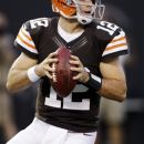 Cleveland Browns quarterback Colt McCoy drops back to pass in the first quarter of a preseason NFL football game against the Chicago Bears, Thursday, Aug. 30, 2012, in Cleveland. (AP Photo/Mark Duncan)