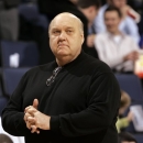 FILE - In this Jan. 14, 2009, file photo, Saint Louis coach Rick Majerus stands on the sidelines during the first half of an NCAA college basketball game against Massachusetts in St. Louis. Majerus, the jovial college basketball coach who led Utah to the 1998 NCAA final and had only one losing season in 25 years with four schools, died Saturday, Dec. 1, 2012. He was 64.  (AP Photo/Jeff Roberson, File)