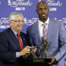 NBA Commissioner David Stern, left, presents Chauncey Billups of the L.A. Clippers with the 2012-2013 Twyman-Stokes Teammate of the Year Award before the start of Game 2 of the NBA Finals basketball game between the Miami Heat and the San Antonio Spurs, Sunday, June 9, 2013 in Miami. The newly created NBA award recognizes the league's ideal teammate. Billups was selected by a panel of 12 NBA legends. (AP Photo/Wilfredo Lee)