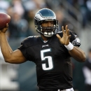FILE - In this Nov. 29, 2009, file photo, Philadelphia Eagles' Donovan McNabb throws a pass during an NFL football game against the Washington Redskins in Philadelphia. McNabb says he will retire with the Philadelphia Eagles this fall. The six-time Pro Bowl quarterback led the Eagles to four NFC championship games and a Super Bowl loss in 11 seasons before he was traded to Washington in 2010. (AP Photo/Matt Slocum, File)