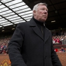 In this Sunday May 5, 2013 photo, Manchester United's manager Sir Alex Ferguson takes to the touchline before his team's English Premier League soccer match against Chelsea at Old Trafford Stadium, Manchester, England. Ferguson will step down as Manchester United manager at the end of the season after 26 years in charge. (AP Photo/Jon Super)