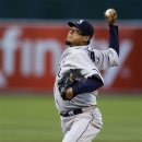 Seattle Mariners' Felix Hernandez works against the Oakland Athletics in the first inning of a baseball game Monday, April 1, 2013, in Oakland, Calif. (AP Photo/Ben Margot)