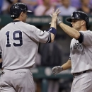 New York Yankees' Brett Gardner, right, high-fives teammate Chris Stewart after Gardner hit a two-run home run off Tampa Bay Rays starting pitcher Roberto Hernandez in the fourth inning of a baseball game, Friday, May 24, 2013, in St. Petersburg, Fla. (AP Photo/Chris O'Meara)