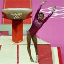 U.S. gymnast Gabrielle Douglas dismounts from the vault during the Artistic Gymnastic women's individual all-around competition at the 2012 Summer Olympics, Thursday, Aug. 2, 2012, in London. (AP Photo/Matt Dunham)