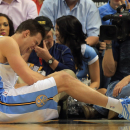 DENVER, CO - APRIL 04:  Danilo Gallinari #8 of the Denver Nuggets grimaces as he injures his left leg and was forced to leave the game against the Dallas Mavericks at the Pepsi Center on April 4, 2013 in Denver, Colorado. (Photo by Doug Pensinger/Getty Images)