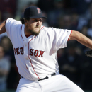 Boston Red Sox relief pitcher Joel Hanrahan delivers to the Baltimore Orioles during the ninth inning of a baseball game at Fenway Park in Boston, Monday, April 8, 2013. (AP Photo/Elise Amendola)