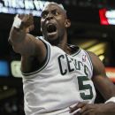 Boston Celtics' Kevin Garnett reacts after making a basket in the first quarter of Game 4 of an NBA basketball first-round playoff series against the Atlanta Hawks, in Boston on Sunday, May 6, 2012. (AP Photo/Michael Dwyer)