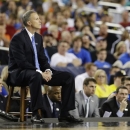 Florida Gulf Coast head coach Andy Enfield watches action against Florida during the second half of a regional semifinal game in the NCAA college basketball tournament, Saturday, March 30, 2013, in Arlington, Texas. (AP Photo/Tony Gutierrez)