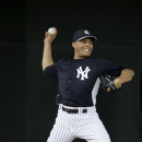 New York Yankees' Mariano Rivera throws in the bullpen during a workout at baseball spring training, Wednesday, Feb. 13, 2013, in Tampa, Fla. (AP Photo/Matt Slocum)