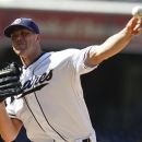 San Diego Padres starting pitcher Clayton Richard works against the Chicago Cubs during the first inning of a baseball game, Wednesday, Aug. 8, 2012, in San Diego. (AP Photo/Lenny Ignelzi)