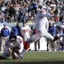 New York Giants kicker Josh Brown (3) kicks a field goal during the second half of an NFL football game against the Philadelphia Eagles on Sunday, Oct. 27, 2013, in Philadelphia. (AP Photo/Michael Perez)