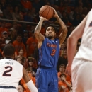 Florida's Mike Rosario shoots a three pointer in the first half of an NCAA college basketball game against Auburn on Saturday, Feb. 16, 2013 in Auburn, Ala.(AP Photo/Todd J. Van Emst)