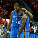 HOUSTON, TX - MAY 03:  Kevin Durant #35 and Reggie Jackson #15 of the Oklahoma City Thunder wait on the court late in the game against the Houston Rockets in Game Six of the Western Conference Quarterfinals of the 2013 NBA Playoffs at the Toyota Center on May 3, 2013 in Houston, Texas. (Photo by Scott Halleran/Getty Images)