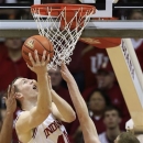 Indiana's Cody Zeller puts up a shot against Jacksonville's Tyler Alderman during the first half of an NCAA college basketball game Friday, Dec. 28, 2012, in Bloomington, Ind. (AP Photo/Darron Cummings)
