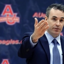 Mike Brennan, the new men's basketball coach at American University, speaks during a media availability Tuesday, April 30, 2013, in Washington. (AP Photo/Alex Brandon)