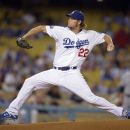 Los Angeles Dodgers starting pitcher Clayton Kershaw throws to a Colorado Rockies batter during the first inning of a baseball game Friday, Sept. 28, 2012, in Los Angeles. (AP Photo/Mark J. Terrill)