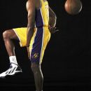 Los Angeles Lakers enter Dwight Howard poses for portraits during their NBA basketball media day at the team's headquarters in El Segundo, Calif., Monday, Oct. 1, 2012. (AP Photo/Reed Saxon)