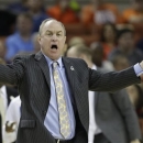 UCLA coach Ben Howland talks to his players during the second half of a second-round game of the NCAA college basketball tournament Friday, March 22, 2013, in Austin, Texas. Minnesota won 83-63. (AP Photo/Eric Gay)
