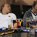 German fans rest in a bar before the Euro 2012 soccer championship quarterfinal match between Germany and Greece in Gdansk, Poland, Friday, June 22, 2012. (AP Photo/Alvaro Barrientos)