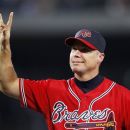 Atlanta Braves third baseman Chipper Jones (10) waves to the crowd during a ceremony honoring him before a baseball game against New York Mets in Atlanta, Friday, Sept. 28, 2012. Jones plans to retire at the end of the season. (AP Photo/John Bazemore)