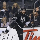 Los Angeles Kings right wing Justin Williams celebrates after scoring a goal against the San Jose Sharks during the second period in Game 7 of the Western Conference semifinals in the NHL hockey Stanley Cup playoffs, Tuesday, May 28, 2013, in Los Angeles.  (AP Photo/Mark J. Terrill)