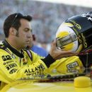 Sam Hornish Jr. prepares to get in AJ Allmendinger's car as a replacement driver in the NASCAR Sprint Cup Series auto race at Daytona International Speedway, Saturday, July 7, 2012, in Daytona Beach, Fla. Allmendinger was temporarily suspended after failing a random drug test. (AP Photo/Terry Renna)