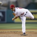 Los Angeles Angels starting pitcher Jason Vargas throws against the Los Angeles Dodgers during the first inning of an interleague baseball game in Anaheim, Calif., Thursday, May 30, 2013. (AP Photo/Jae C. Hong)