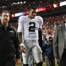 FILE - In this Sept. 23, 2013 file photo, Oakland Raiders quarterback Terrelle Pryor (2) leaves the field late in the fourth quarter of an NFL football game against the Denver Broncos in Denver. The Raiders enter a short week of preparation with uncertainty at quarterback. (AP Photo/Joe Mahoney, File)