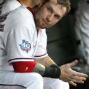 Texas Rangers center fielder Josh Hamilton sits in the dugout during the baseball game against the Minnesota Twins, Friday, July 6, 2012, in Arlington, Texas. (AP Photo/LM Otero)