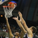 Brooklyn Nets' Deron Williams (8) and Brook Lopez (11) attempt to grab a rebound against the Philadelphia 76ers in the first half during a preseason NBA basketball game, Saturday, Oct. 13, 2012, in Atlantic City, N.J. (AP Photo/Rich Schultz)