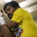 Boxer Manny Pacquiao of the Philippines trains during a media workout in Hong Kong October 27, 2014. REUTERS/Tyrone Siu