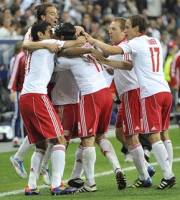 Salzburg's players celebrate after scoring during the Group F Europa League soccer match between Red Bull Salzburg and SK Slovan Bratislava  in Salzburg, Austria, Thursday , Sept. 29, 2011.