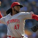 Cincinnati Reds starting pitcher Johnny Cueto (47) delivers during the fifth inning of a baseball game against the Pittsburgh Pirates in Pittsburgh Sunday, Sept. 30, 2012. The Reds won 4-3, with Cueto not figuring in the decision. (AP Photo/Gene J. Puskar)