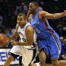 FILE - In this Dec. 14, 2008, file photo, San Antonio Spurs guard Tony Parker, left, of France, drives around Oklahoma City Thunder guard Russell Westbrook (0) during the first half of an NBA basketball game in San Antonio. Parker had two NBA titles when he was Westbrook's age. That makes the All-Star point guards chasing different legacies in what will be the marquee matchup of the Western Conference Finals.(AP Photo/Darren Abate, File)
