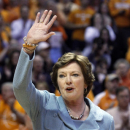 Tennessee head coach emeritus Pat Summitt waves to fans as a banner in her honor was raised before an NCAA college basketball game between the Tennessee and Notre Dame on Monday, Jan. 28, 2013, in Knoxville, Tenn. (AP Photo/Wade Payne)
