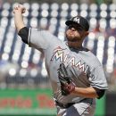 Miami Marlins starting pitcher Ricky Nolasco throws during the first inning of a baseball game against the Washington Nationals at Nationals Park, Sunday, Sept. 9, 2012, in Washington. (AP Photo/Alex Brandon)