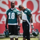 Philadelphia Eagles wide receiver DeSean Jackson, right, and Jeremy Maclin take a break between drills at NFL football training camp in Philadelphia, Friday, July 26, 2013. (AP Photo/The News Journal, Suchat Pederson)
