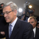 FILE - This Nov. 7, 2011 file photo shows former Penn State athletic director Tim Curley, left, and former Penn State Vice President Gary Schultz, right, entering a district judge's office for an arraignment in Harrisburg, Pa. Penn State will not renew the contract of athletic director Curley, who has been on leave since being charged last year with perjury and failing to report a child sex abuse allegation against Jerry Sandusky.  (AP Photo/Bradley C. Bower, File)