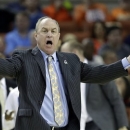 In this Friday, March 22, 2013, photo, UCLA coach Ben Howland talks to his players during the second half of a second-round game of the NCAA college basketball tournament in Austin, Texas. UCLA announced Sunday, March 24, 2013, that the university has fired Ben Howland as basketball coach after 10 seasons that included three Final Four appearances, but culminated with another early-round exit from the NCAA tournament. (AP Photo/Eric Gay)
