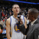 OAKLAND, CA - JANUARY 31: Klay Thompson #11 of the Golden State Warriors is interviewed by David Aldridge after a game against the Dallas Mavericks on January 31, 2013 at Oracle Arena in Oakland, California. (Photo by Rocky Widner/NBAE via Getty Images)