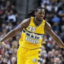 Denver Nuggets forward Kenneth Faried celebrates after scoring a basket against the Chicago Bulls in the second quarter of an NBA basketball game in Denver on Thursday, Feb. 7, 2013. (AP Photo/David Zalubowski)