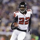 Atlanta Falcons cornerback Asante Samuel cares the ball during the first half of a preseason NFL football game against the Baltimore Ravens in Baltimore, Thursday Aug. 15, 2013. (AP Photo/Patrick Semansky)